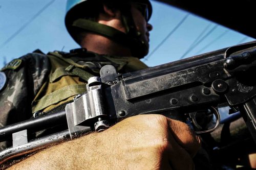 Jan 2006, POrt au Prince: bralislan soldier patrolling
Lorenzo Moscia/GraziaNeri