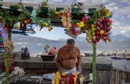 Naples, July 2022. People head to the waterfront seeking refreshment from the heat wave.