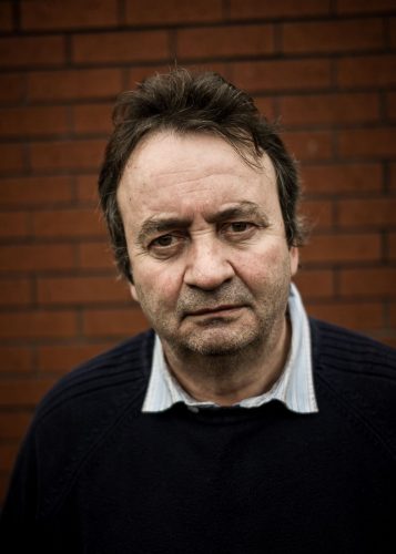 Belfast, Northern Ireland, 2013. Gerry Conlon (59) in his house in Belfast, showing pictures of his parents.Conlon spent 15 years in prison for a crime he didn't commit. His history has been brought in the movie 